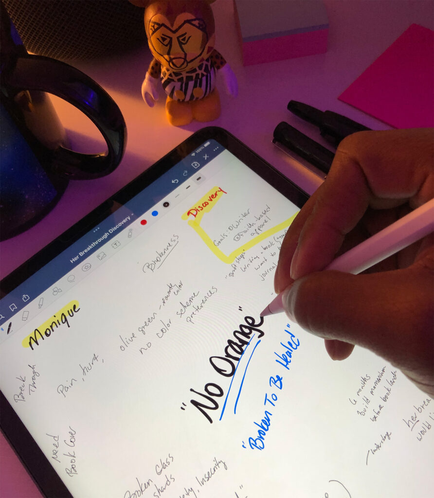 Photo of Brian writing "No Orange" on his Discovery Call notes on an iPad